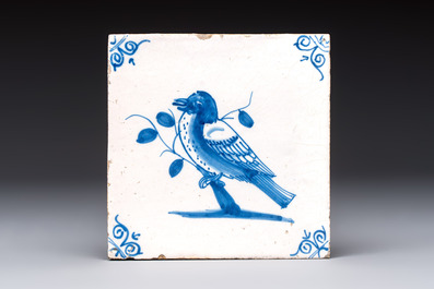 15 blue and white Dutch Delft tiles with large birds, 17th C.