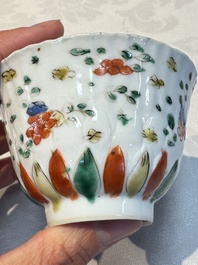 Seven Chinese famille verte cups and four saucers, conch shell and lingzhi marks, Kangxi