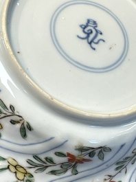 Seven Chinese famille verte cups and four saucers, conch shell and lingzhi marks, Kangxi