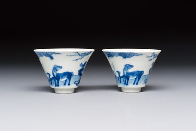A pair of Chinese blue and white 'Bleu de Hue' cups with zodiac animals, Noi Phu 內府 mark, 19th C.