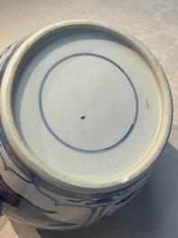 A Chinese blue and white 'Antiquities and Flower Baskets' vase with a wooden cover, Kangxi