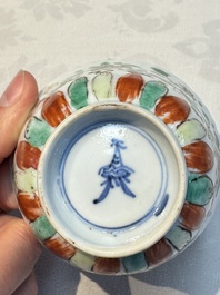Seven Chinese famille verte cups and four saucers, conch shell and lingzhi marks, Kangxi