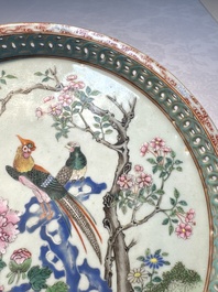 A fine Chinese famille rose pale celadon-ground 'phoenixes' dish with a reticulated rim, Qianlong