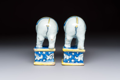 A pair of blue, white and yellow Frankfurt faience models of elephants, ca. 1700