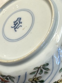Seven Chinese famille verte cups and four saucers, conch shell and lingzhi marks, Kangxi