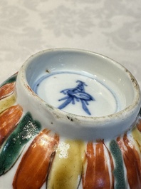 Seven Chinese famille verte cups and four saucers, conch shell and lingzhi marks, Kangxi