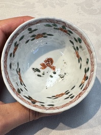 Seven Chinese famille verte cups and four saucers, conch shell and lingzhi marks, Kangxi