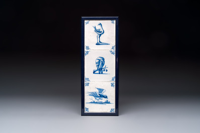 15 blue and white Dutch Delft tiles with large birds, 17th C.