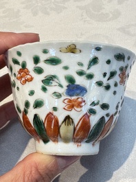 Seven Chinese famille verte cups and four saucers, conch shell and lingzhi marks, Kangxi