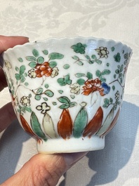 Seven Chinese famille verte cups and four saucers, conch shell and lingzhi marks, Kangxi