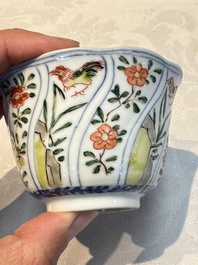 Seven Chinese famille verte cups and four saucers, conch shell and lingzhi marks, Kangxi