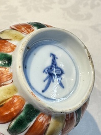 Seven Chinese famille verte cups and four saucers, conch shell and lingzhi marks, Kangxi