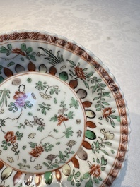 Seven Chinese famille verte cups and four saucers, conch shell and lingzhi marks, Kangxi
