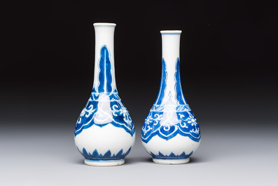 A Chinese blue and white covered vase and two bottle vases, Chenghua and jade marks, Kangxi