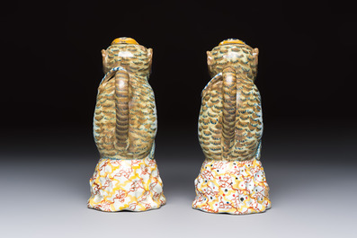 A pair of polychrome Dutch Delft monkey ewers and covers, 18th C.
