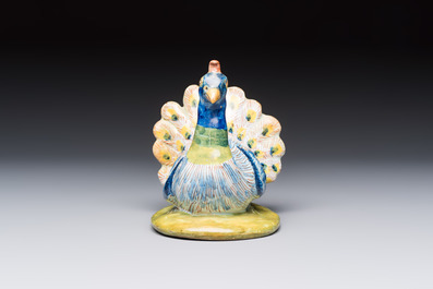 A polychrome Dutch Delft 'Peacock' cover, 18th C.