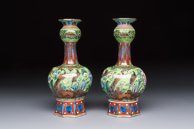 A pair of clobbered Dutch Delft vases, 17th C.