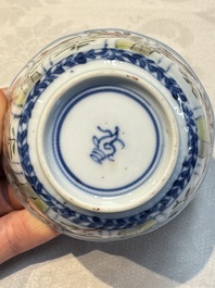 Seven Chinese famille verte cups and four saucers, conch shell and lingzhi marks, Kangxi