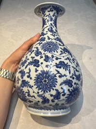 A Chinese blue and white 'Yuhuchunping' vase with lotus scroll design, Qianlong mark and of the period