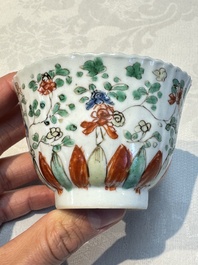 Seven Chinese famille verte cups and four saucers, conch shell and lingzhi marks, Kangxi