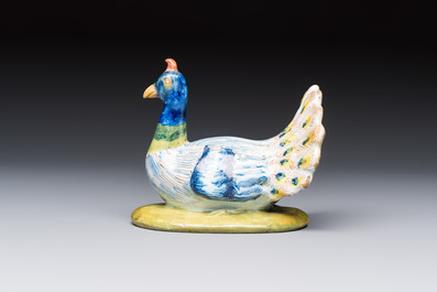 A polychrome Dutch Delft 'Peacock' cover, 18th C.
