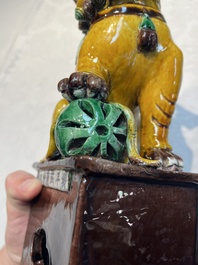A pair of Chinese sancai-glazed Buddhist lions, Kangxi mark, 19th C.