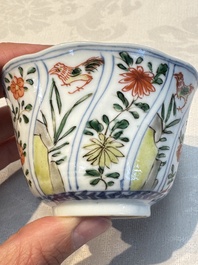 Seven Chinese famille verte cups and four saucers, conch shell and lingzhi marks, Kangxi