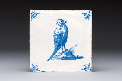 15 blue and white Dutch Delft tiles with large birds, 17th C.