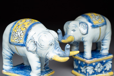 A pair of blue, white and yellow Frankfurt faience models of elephants, ca. 1700