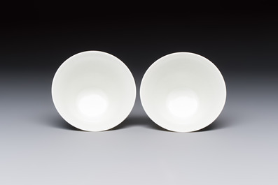 A pair of Chinese blue and white 'Bleu de Hue' 'Dragon' cups, Nhuoc Tham Tran Tang 若深珍藏 mark, 19th C.