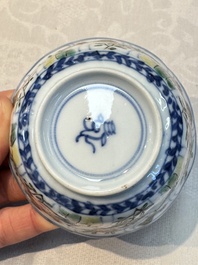 Seven Chinese famille verte cups and four saucers, conch shell and lingzhi marks, Kangxi