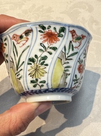 Seven Chinese famille verte cups and four saucers, conch shell and lingzhi marks, Kangxi