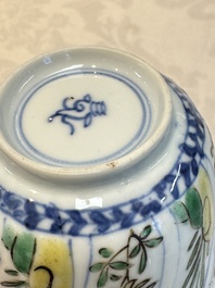 Seven Chinese famille verte cups and four saucers, conch shell and lingzhi marks, Kangxi