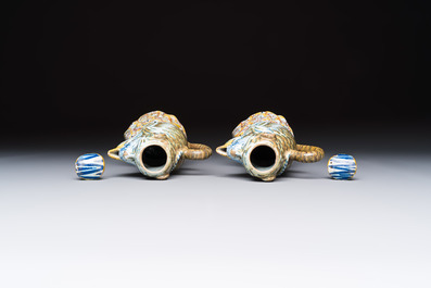 A pair of polychrome Dutch Delft monkey ewers and covers, 18th C.