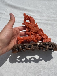 A Chinese carved red coral 'Birds and Flowers' group on a wooden stand, 19/20th C.