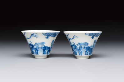 A pair of Chinese blue and white 'Bleu de Hue' cups with zodiac animals, Noi Phu 內府 mark, 19th C.