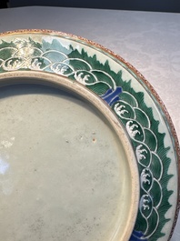 A fine Chinese famille rose pale celadon-ground 'phoenixes' dish with a reticulated rim, Qianlong