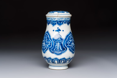 A Chinese blue and white covered vase and two bottle vases, Chenghua and jade marks, Kangxi