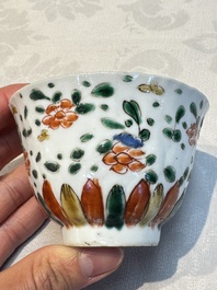 Seven Chinese famille verte cups and four saucers, conch shell and lingzhi marks, Kangxi