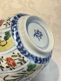Seven Chinese famille verte cups and four saucers, conch shell and lingzhi marks, Kangxi