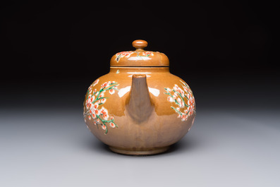 A large Chinese famille verte capucin-ground 'Prunus Blossoms' teapot and cover with relief design, Kangxi