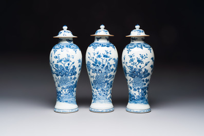 A Chinese blue and white five-piece garniture with birds among flowering branches, Qianlong