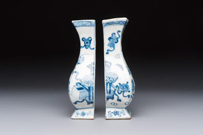 A pair of Chinese blue and white 'Antiquities' wall pocket vases, Kangxi