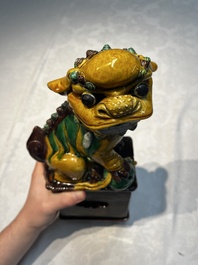 A pair of Chinese sancai-glazed Buddhist lions, Kangxi mark, 19th C.