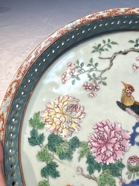 A fine Chinese famille rose pale celadon-ground 'phoenixes' dish with a reticulated rim, Qianlong
