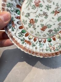 Seven Chinese famille verte cups and four saucers, conch shell and lingzhi marks, Kangxi