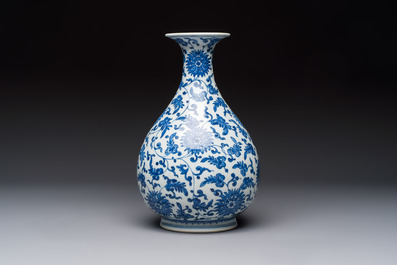 A Chinese blue and white 'Yuhuchunping' vase with lotus scroll design, Qianlong mark and of the period