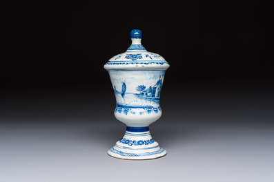 A blue and white inscribed Dutch Delft children's money bank, dated 1786