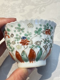 Seven Chinese famille verte cups and four saucers, conch shell and lingzhi marks, Kangxi