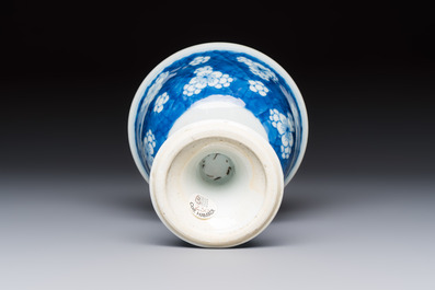 A Chinese blue and white 'Prunus on Cracked Ice' stem bowl, Kangxi